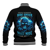 Black baseball jacket with blue skull lightning graphic on back and striped ribbed hem
