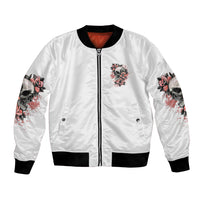 White bomber jacket with black ribbed hem, front zip, and skull-and-rose sleeve prints