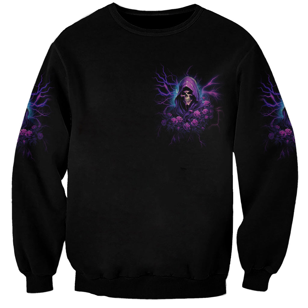 Black unisex sweatshirt with small purple electric skull-and-roses graphic on chest