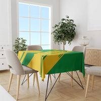 Comoros flag tablecloth with draped green and yellow flag pattern on dining table