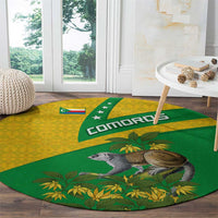 Round Comoros flag area rug in green and yellow with lemur and leaf accents