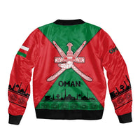Green and red bomber jacket with back crossed khanjar star emblem and OMAN text