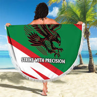 Fringed round beach blanket featuring falcon graphic with Oman flag colors and slogan