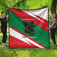 Oman quilt with red, green, and white diagonal stripes; quilted texture and falcon graphic
