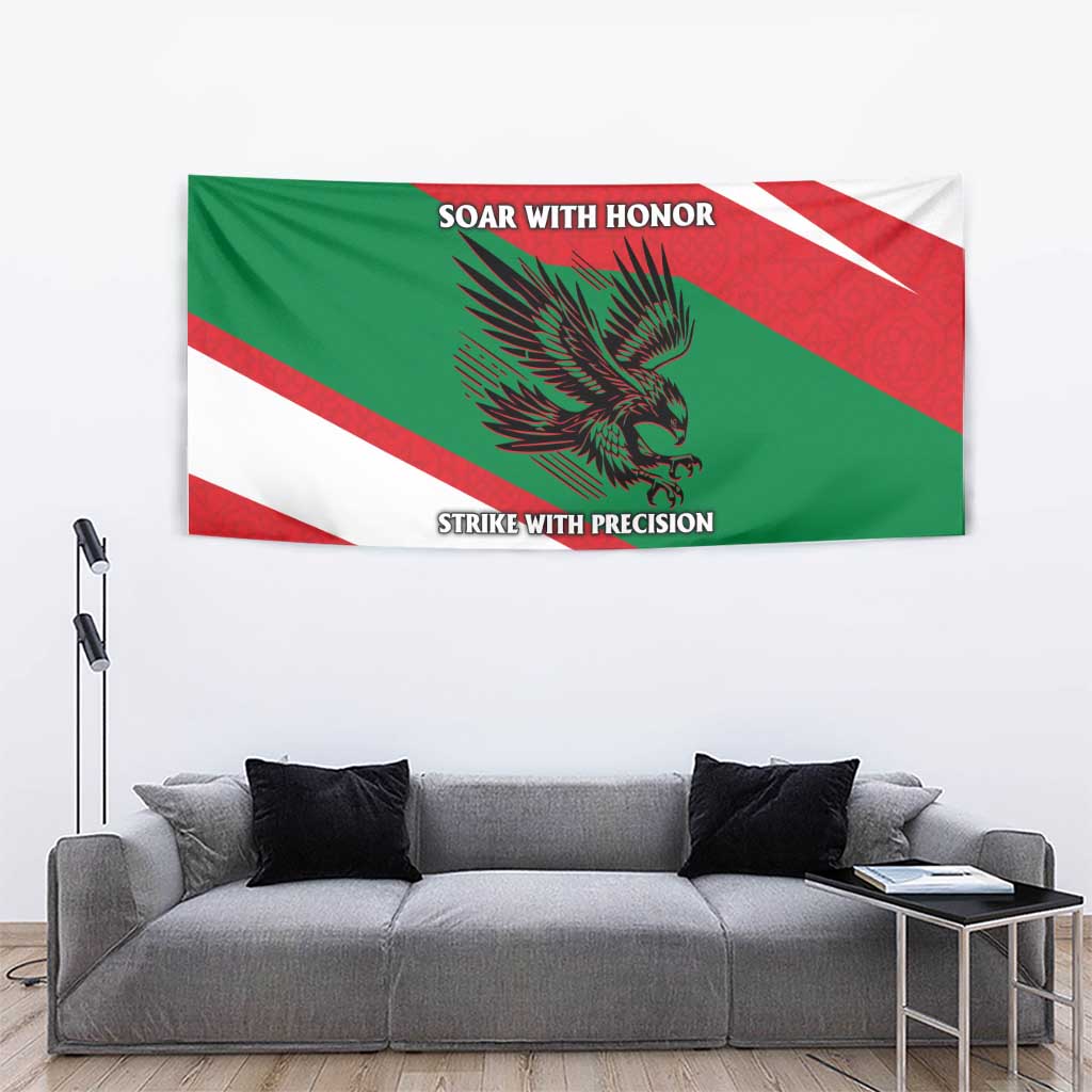 Oman flag tapestry hanging above sofa, showing falcon design and diagonal stripes