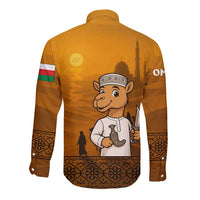 Long-sleeve button shirt back view in mustard with camel character and skyline print