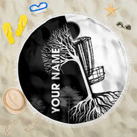 Black and white round beach blanket with tree and roots graphic, fringe edge