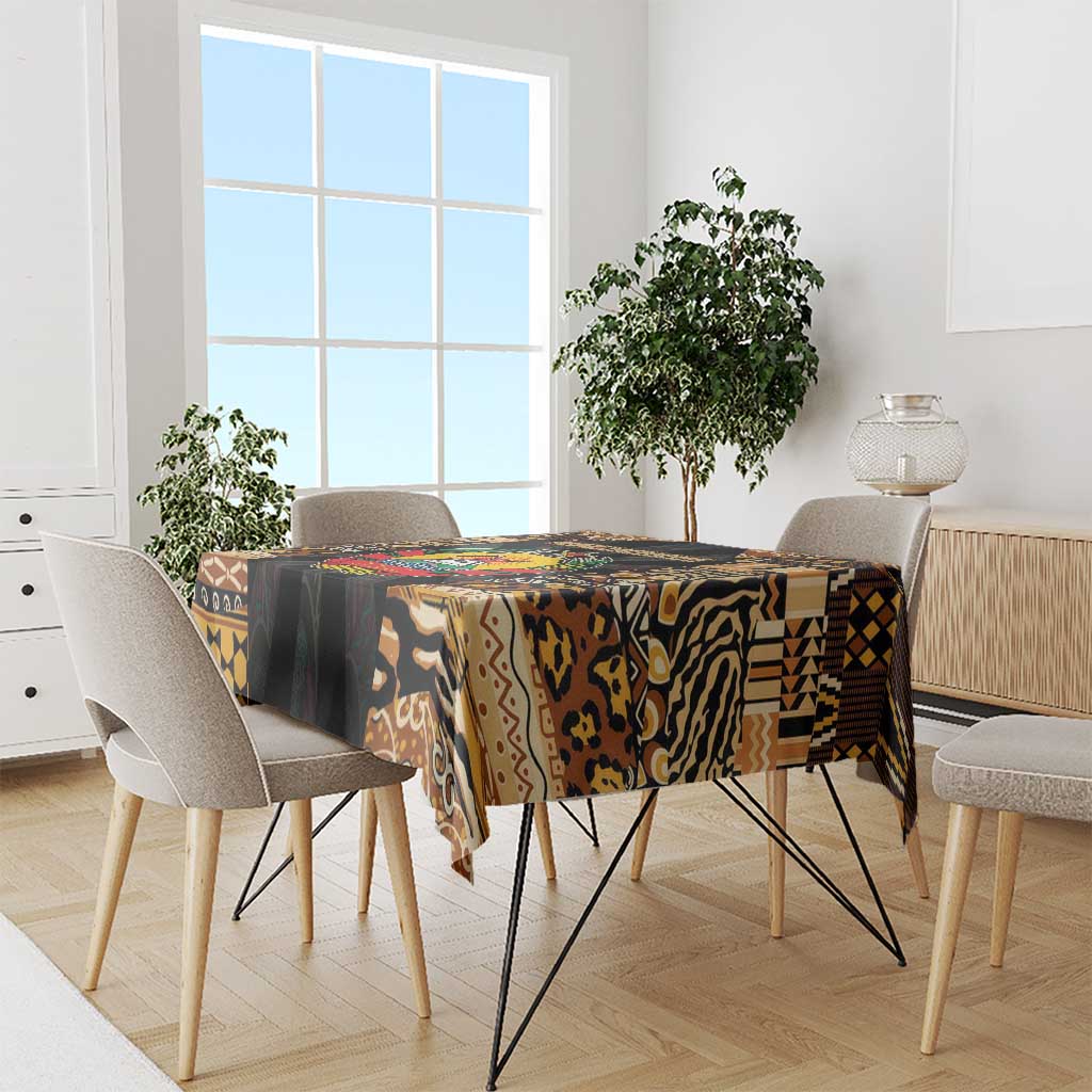 Multicolor tribal tablecloth draped over dining table, black, brown, and tan patterns