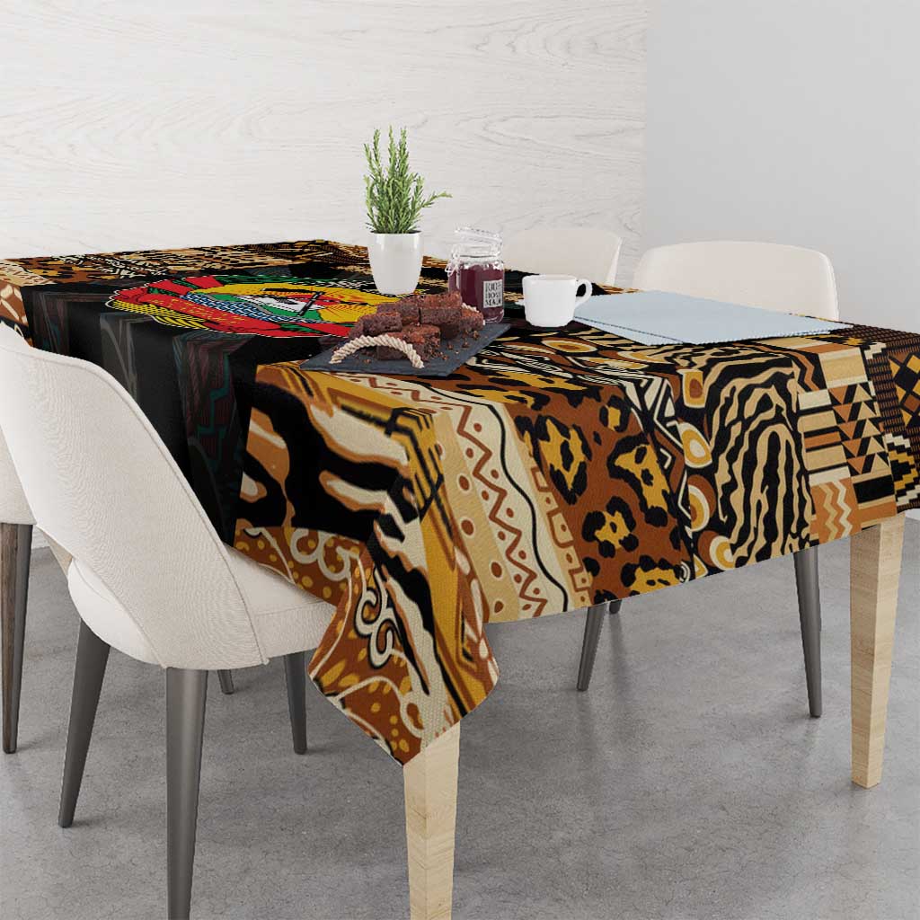 Rectangular tribal tablecloth with animal-print style motifs and colorful banding