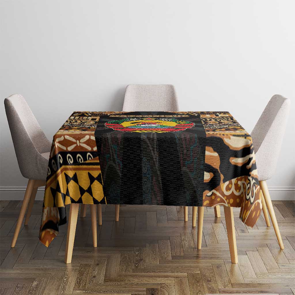 Colorful tribal tablecloth on dining table with dark center panel and beige border