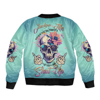 Light teal bomber jacket, ribbed cuffs, skull graphic with 'Shut Up' on back