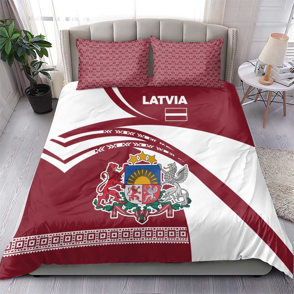 Red and white duvet and matching pillows with Latvia text, flag stripe design, coat of arms