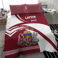 Red and white Latvia duvet with crest coat of arms, flag stripes, and patterned pillowcases