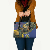 Multicolor leather tote with jungle animal print and emblem badge