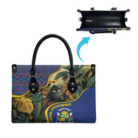 Multicolor leather tote bag showing top zipper opening and carry handle