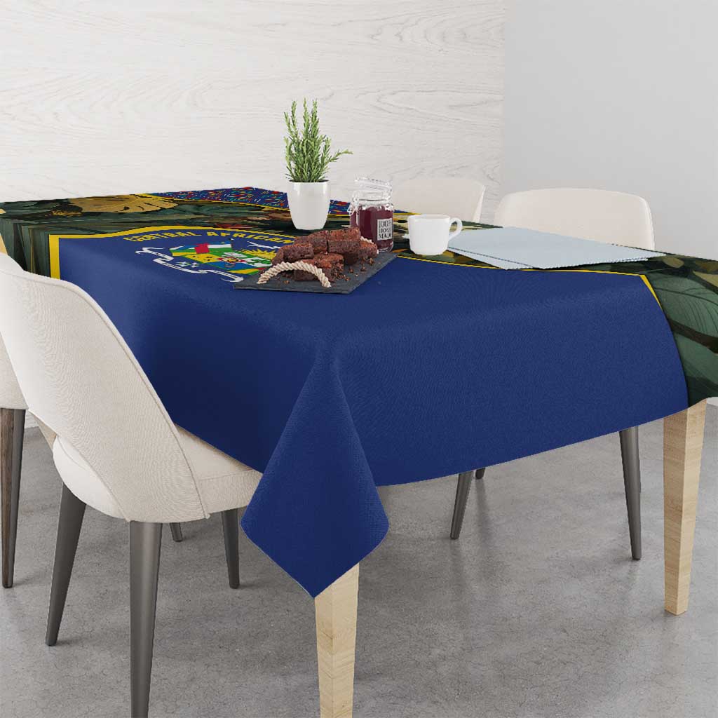 Rectangular blue tablecloth with jungle animal panel and yellow stripe edge detail.