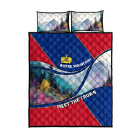 Quilt bed set with matching pillowcases, mountain landscape print in red and blue, crown logo