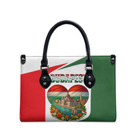 Tricolor handbag with black top handles and Budapest heart illustration