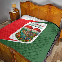 Quilted bedspread with Budapest heart emblem over red and green fabric