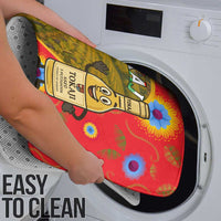Multicolor washable shower curtain laid on a washing machine drum, easy-clean style
