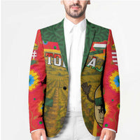 Multicolor blazer worn with white shirt; front lapels and grape illustration panel