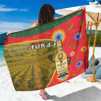 Multicolor illustrated sarong with TOKAJ wine bottle and vineyard scene, red and green