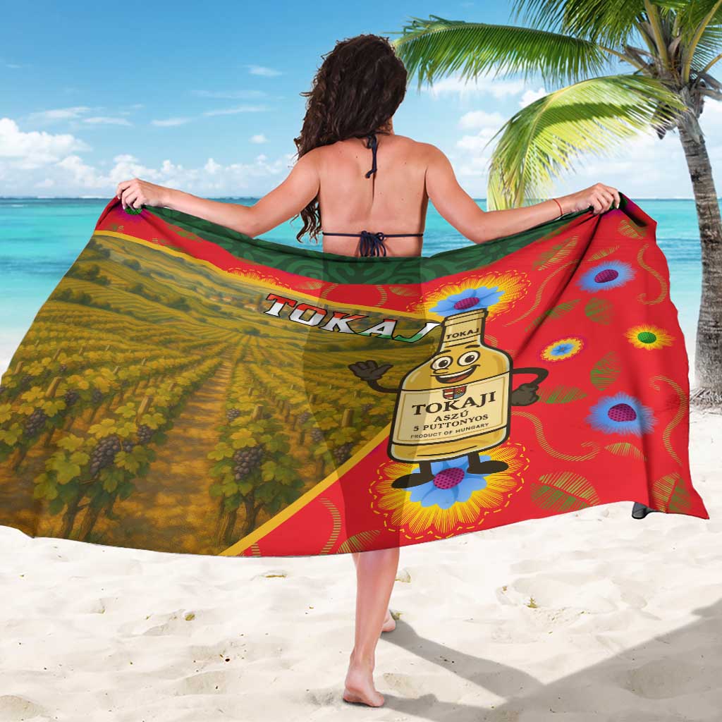 Multicolor sarong draped on back, TOKAJ vineyard and wine bottle illustration in red/green