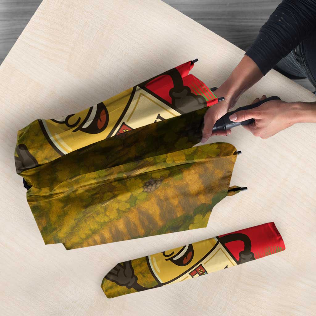 Folded multicolor umbrella with Tokaji bottle graphic and vineyard pattern