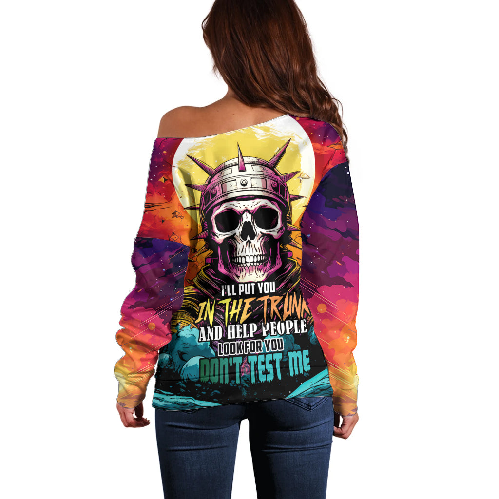 Off-shoulder multicolor sweater with astronaut skull graphic, back view.
