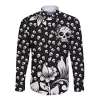 Black long sleeve button shirt with allover skulls and large skull-floral motif