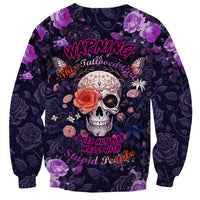 Unisex sweatshirt with purple floral skull, butterflies, and 'Warning' text, long sleeves