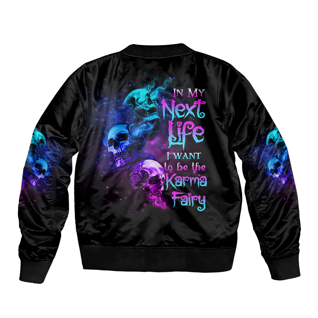 Black bomber jacket with multicolor skull-fairy graphic on back, ribbed cuffs