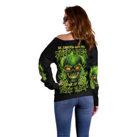 Women’s off-shoulder sweater, black with neon green reaper skull back graphic, side view