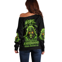 Off-shoulder black sweater with neon-green skull graphic and long sleeves (back view)
