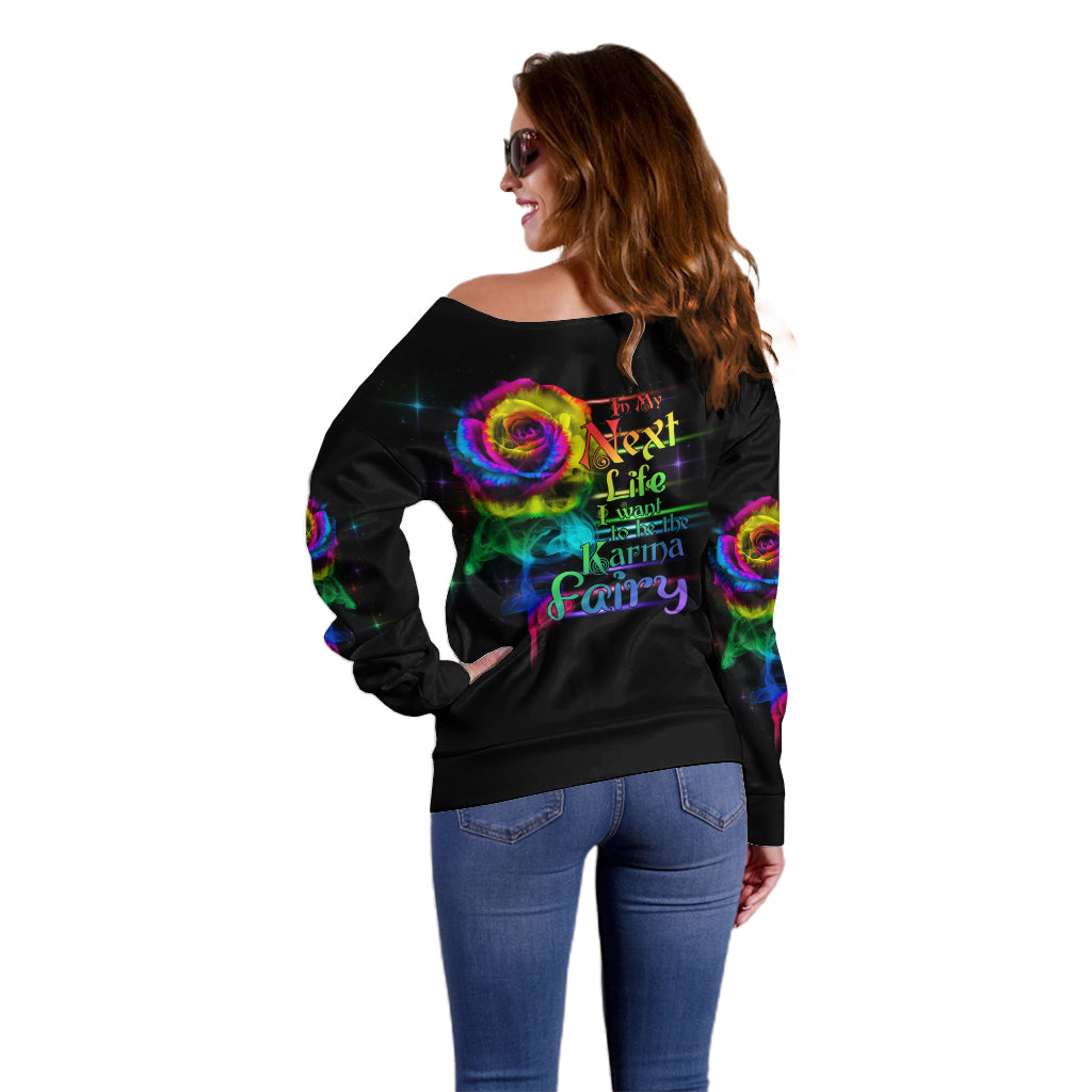 Black off-shoulder sweater with colorful rose smoke graphic on back