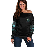 Women's off-shoulder sweater, black with teal skull-and-rose front print