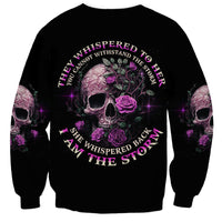Black crewneck sweatshirt with purple skull-and-rose front graphic