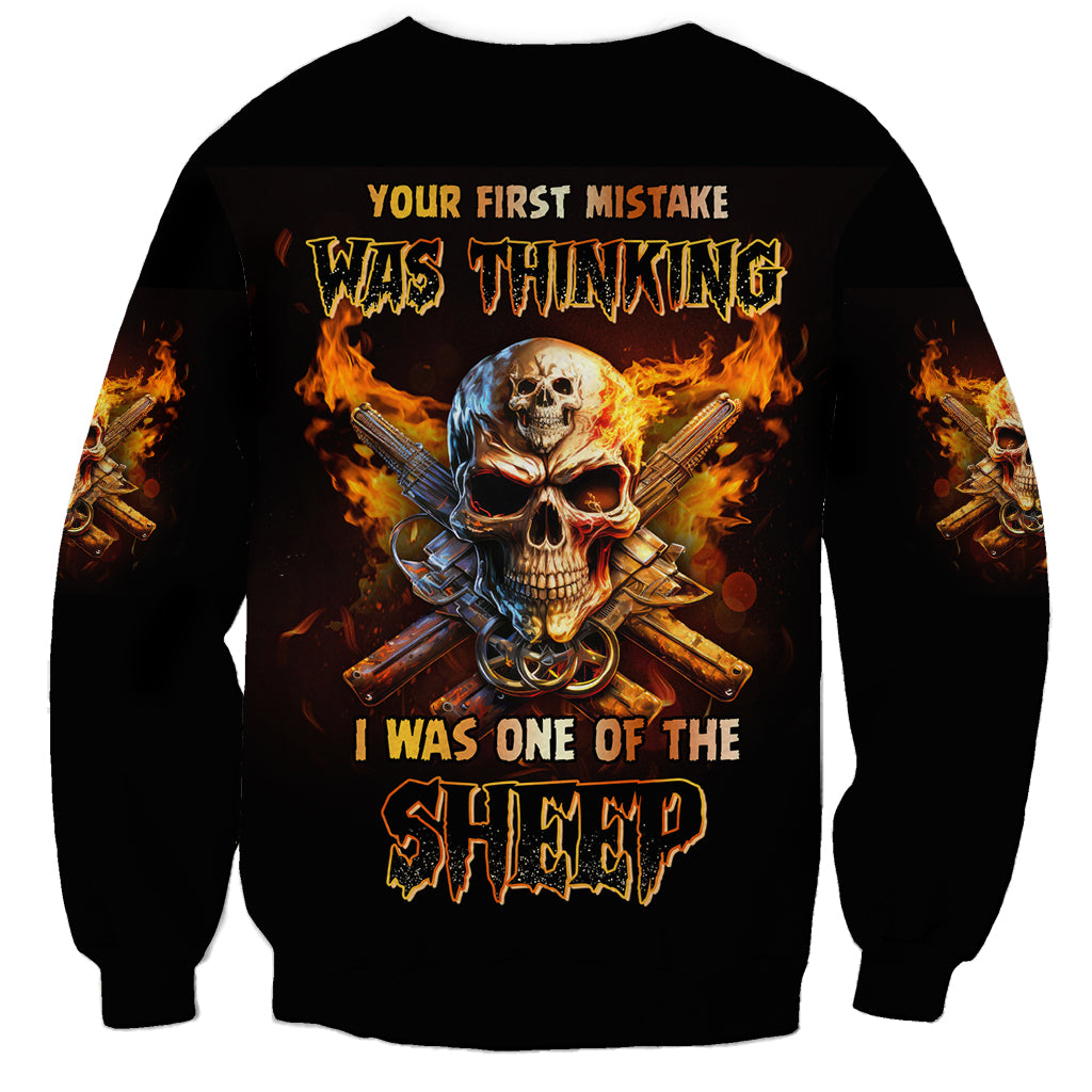 Black sweatshirt with fiery skull and guns graphic, flame text on back