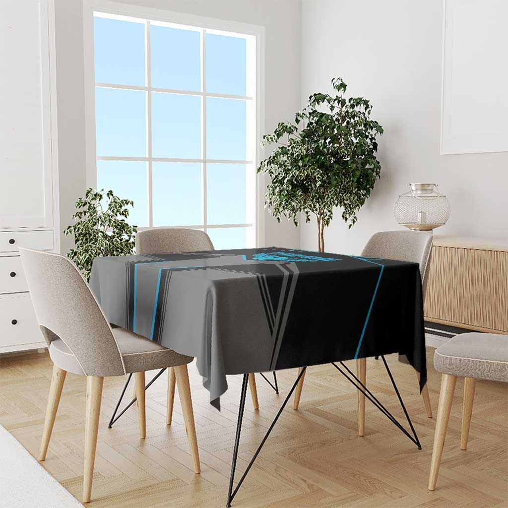 Black and blue bowling tablecloth on dining table with chairs and plants