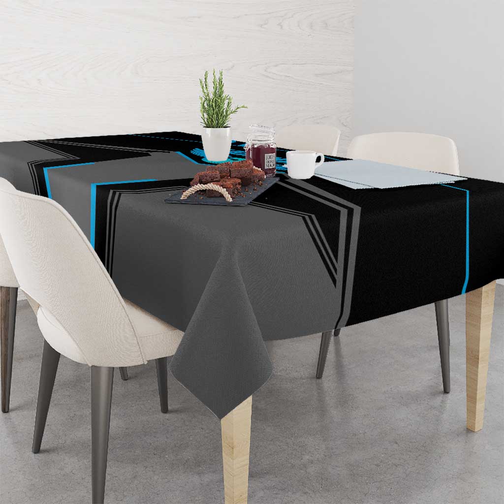 Black and blue bowling tablecloth on dining table with geometric side stripes