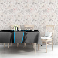 Black and blue bowling tablecloth on dining table with chairs and table decor