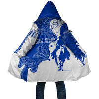 Blue and white hooded cloak with gaucho rider illustration and swirl pattern