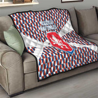 Czech Republic quilt draped on sofa with blue red white geometric design and lion emblem