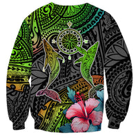 Unisex sweatshirt with centered compass and whale graphic, floral accents, gradient pattern