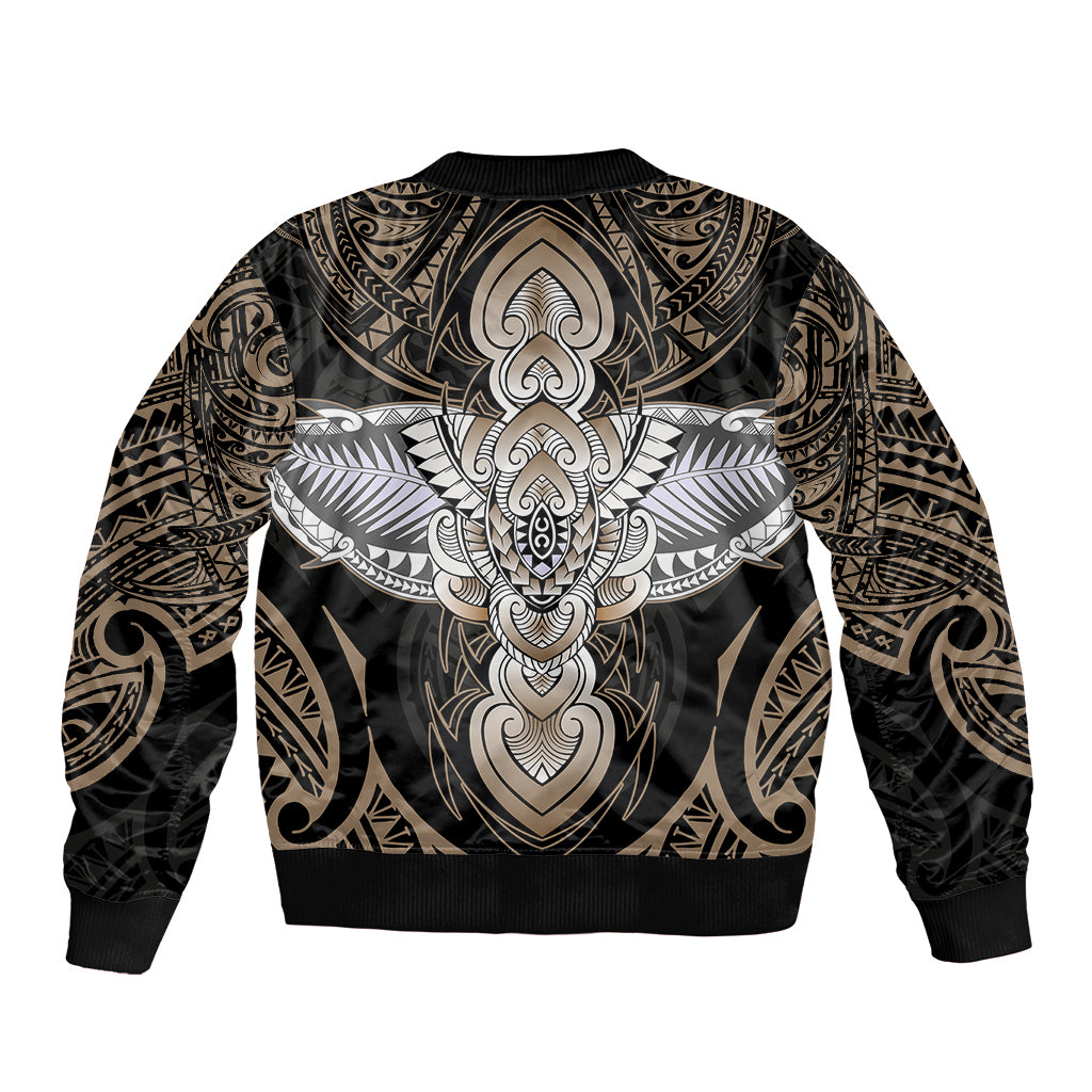 Unisex bomber jacket back with large Polynesian-style tattoo graphic, gold and gray