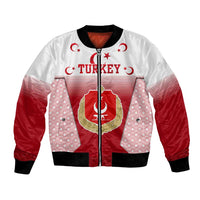 White and red zip-up bomber jacket with Turkey graphic, emblem, and striped chest