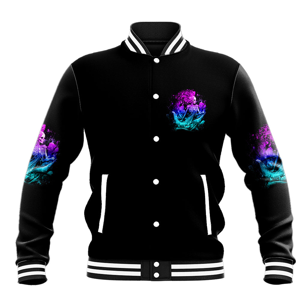 Black varsity baseball jacket with small purple/blue mermaid graphic, snap button front