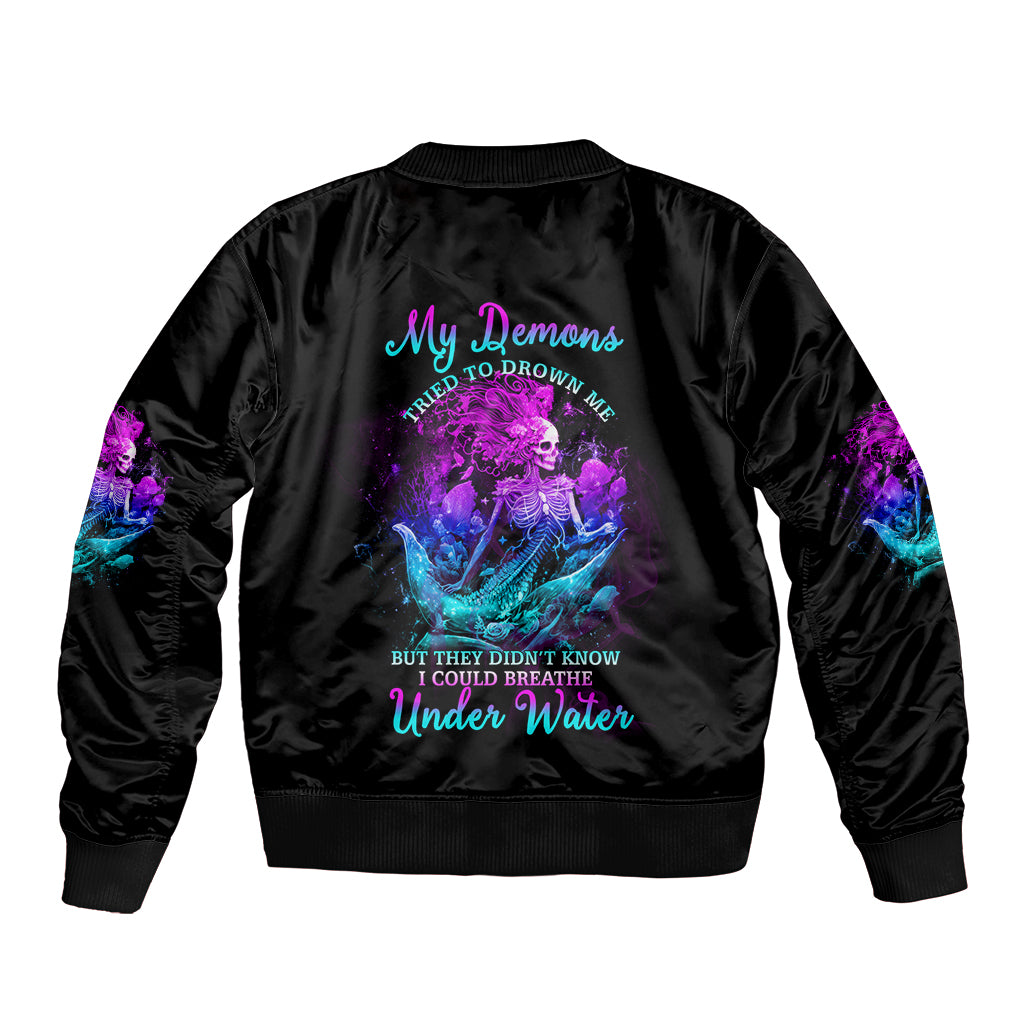 Black bomber jacket with multicolor skull under-water back graphic and ribbed cuffs