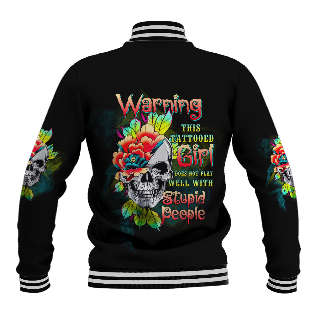 Black baseball jacket with striped ribbed collar and large back skull-and-flower graphic