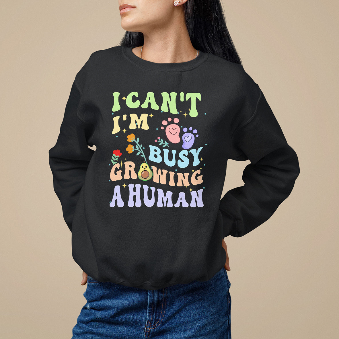 Black pregnancy announcement sweatshirt with “I can't I'm busy growing a human” graphic